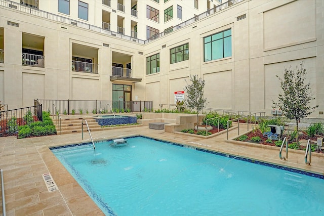 view of swimming pool featuring a patio