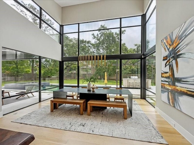 common area featuring a sunroom