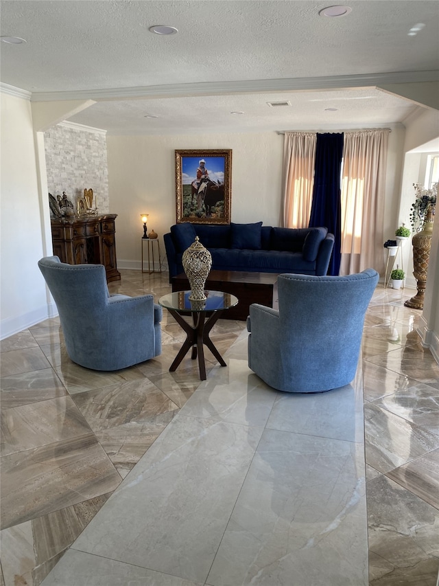 1319 Cherry Spring Dr, Houston, TX 77038 - living area featuring baseboards, marble finish floor, a textured ceiling, and crown molding