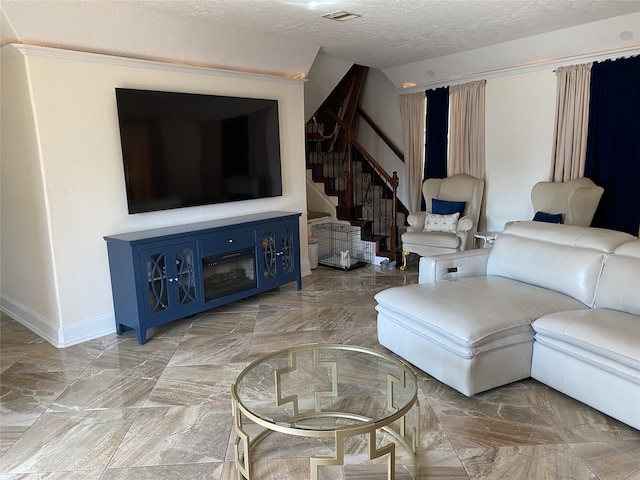 1319 Cherry Spring Dr, Houston, TX 77038 - living area with stairs, baseboards, a textured ceiling, marble finish floor, and visible vents