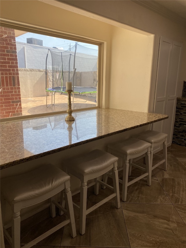 1319 Cherry Spring Dr, Houston, TX 77038 - dining room featuring crown molding