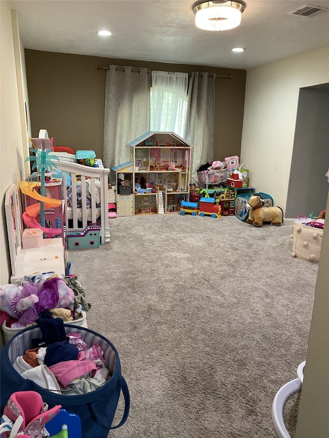 1319 Cherry Spring Dr, Houston, TX 77038 - playroom with visible vents, carpet floors, and recessed lighting