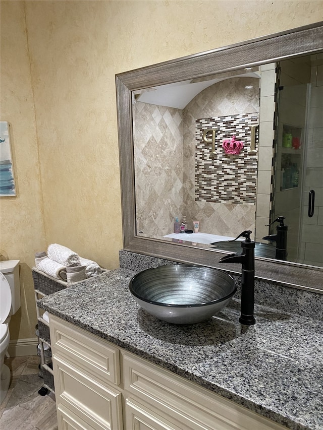 1319 Cherry Spring Dr, Houston, TX 77038 - full bath with a shower stall, a textured wall, toilet, and vanity