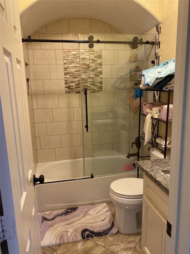 1319 Cherry Spring Dr, Houston, TX 77038 - bathroom featuring lofted ceiling, toilet, vanity, and enclosed tub / shower combo