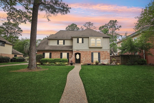 5306 Havenwoods Dr, Houston, TX 77066 - traditional-style house with brick siding and roof with shingles