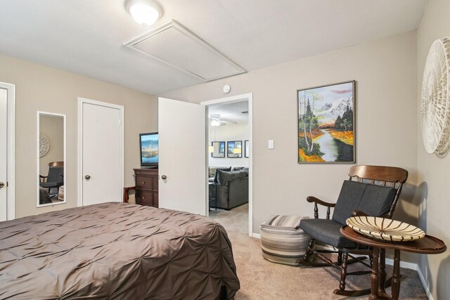 5306 Havenwoods Dr, Houston, TX 77066 - bedroom featuring attic access, light carpet, and baseboards
