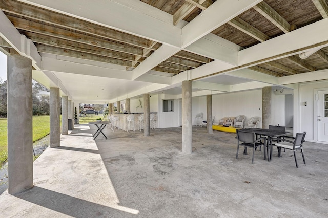 view of patio featuring outdoor dining area