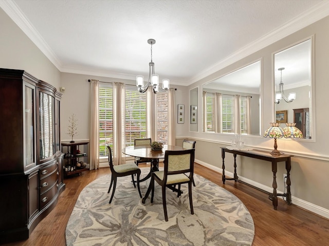 15415 Parkwood Way, Houston, TX 77059 - dining room with dark wood-type flooring, ornamental molding, plenty of natural light, and a chandelier