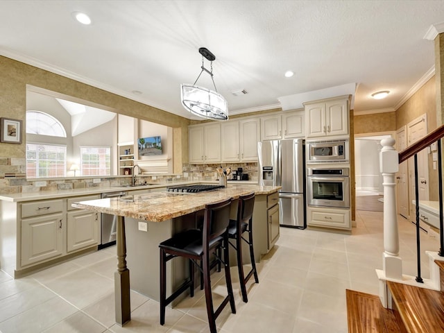 15415 Parkwood Way, Houston, TX 77059 - kitchen featuring light stone counters, light tile patterned floors, a center island, backsplash, and stainless steel appliances