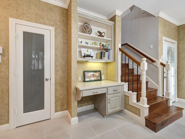 15415 Parkwood Way, Houston, TX 77059 - interior space featuring ornamental molding, built in study area, baseboards, and tile patterned floors