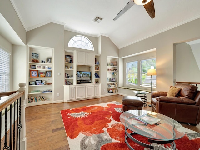 15415 Parkwood Way, Houston, TX 77059 - living area featuring a ceiling fan, visible vents, ornamental molding, lofted ceiling, and light wood finished floors