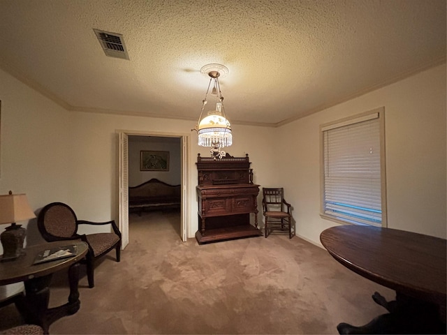 sitting room featuring light carpet, visible vents, a textured ceiling, and crown molding