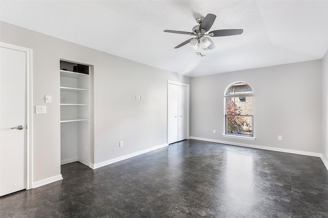 18510 Bluffview Dr, Crosby, TX 77532 - unfurnished room with finished concrete floors, baseboards, and ceiling fan