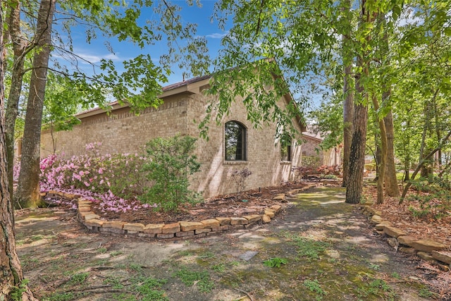 18510 Bluffview Dr, Crosby, TX 77532 - view of home's exterior featuring brick siding