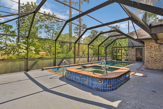 18510 Bluffview Dr, Crosby, TX 77532 - view of pool featuring a patio, glass enclosure, and a pool with connected hot tub
