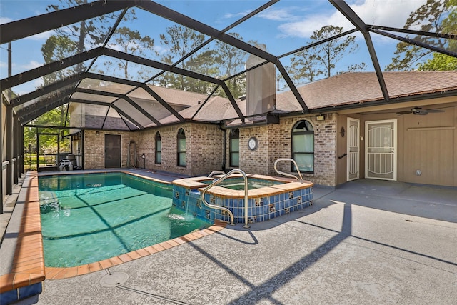 18510 Bluffview Dr, Crosby, TX 77532 - view of pool featuring a pool with connected hot tub, a lanai, and a patio area