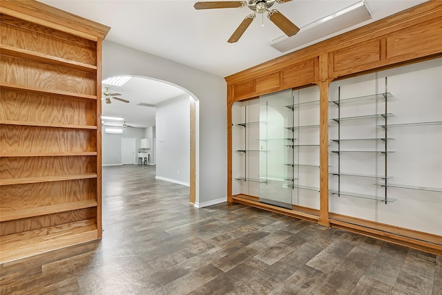 18510 Bluffview Dr, Crosby, TX 77532 - mudroom featuring baseboards, arched walkways, ceiling fan, and dark wood-style floors