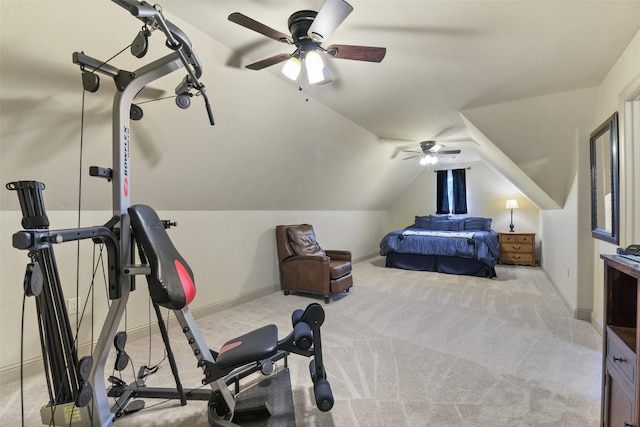 bedroom featuring light colored carpet, lofted ceiling, and a ceiling fan
