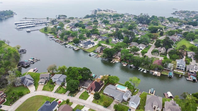 birds eye view of property featuring a residential view and a water view