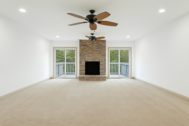 unfurnished living room featuring a ceiling fan, recessed lighting, and plenty of natural light