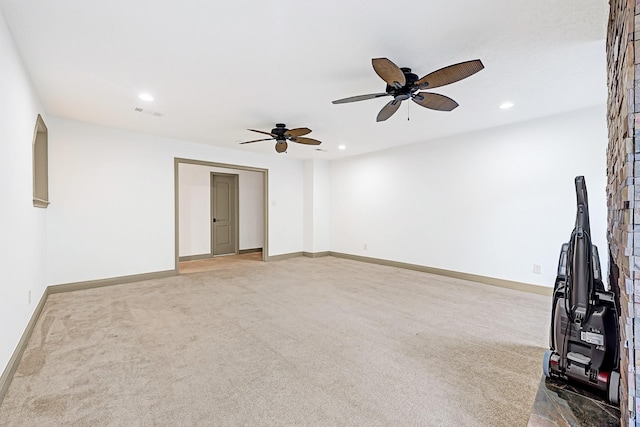 unfurnished living room with carpet floors, baseboards, a ceiling fan, and recessed lighting