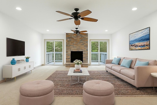 carpeted living room featuring recessed lighting, a ceiling fan, and a healthy amount of sunlight