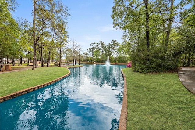 12126 Guadalupe Trail Ln, Humble, TX 77346 - view of pool with a water view and a yard