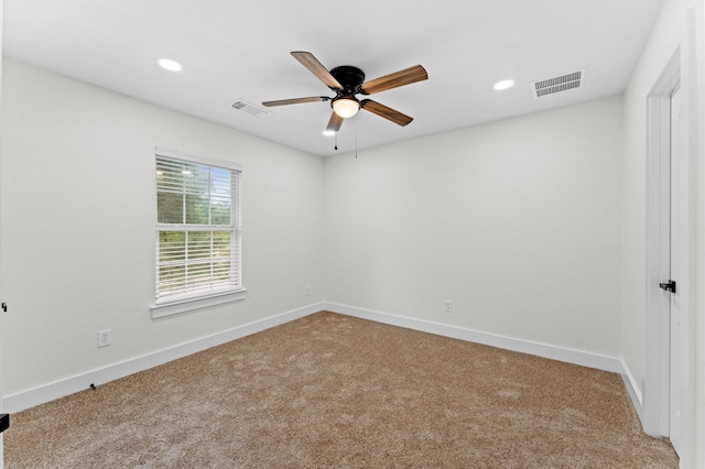 12126 Guadalupe Trail Ln, Humble, TX 77346 - empty room featuring carpet flooring, a ceiling fan, baseboards, and visible vents