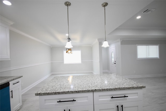 kitchen with crown molding, open floor plan, light stone counters, dishwasher, and white cabinets