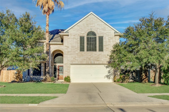 21122 Covington Bridge Dr, Spring, TX 77388 - view of front facade featuring a garage, brick siding, and concrete driveway