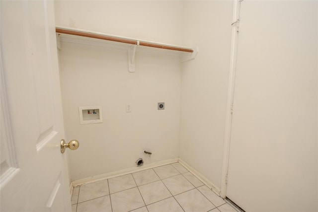 21122 Covington Bridge Dr, Spring, TX 77388 - laundry area featuring washer hookup, light tile patterned flooring, hookup for an electric dryer, and gas dryer hookup