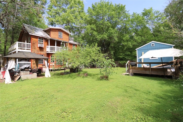 view of yard with a deck