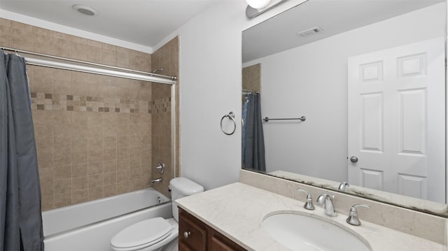 full bath with visible vents, toilet, vanity, and shower / bath combination with curtain