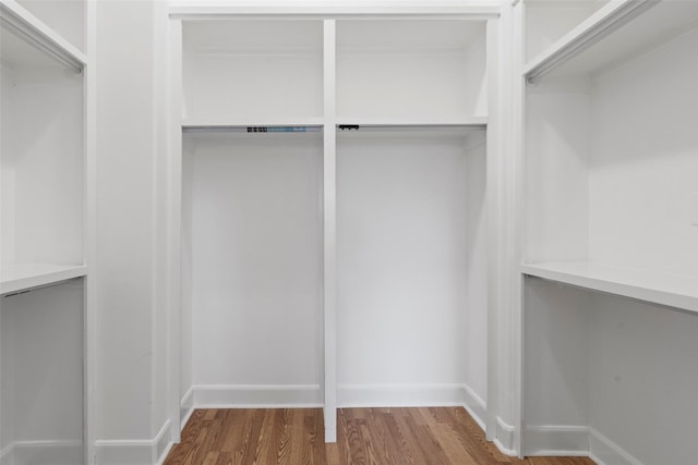 spacious closet with wood finished floors