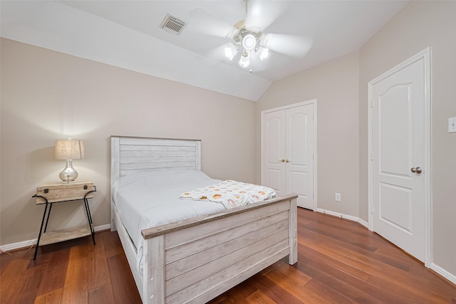 1218 Ventura Canyon Dr, Katy, TX 77494 - bedroom featuring dark wood-style flooring, baseboards, vaulted ceiling, a closet, and visible vents