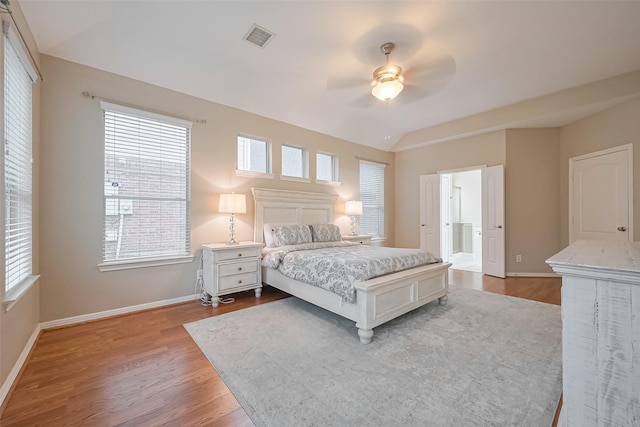 1218 Ventura Canyon Dr, Katy, TX 77494 - bedroom with visible vents, baseboards, vaulted ceiling, and wood finished floors