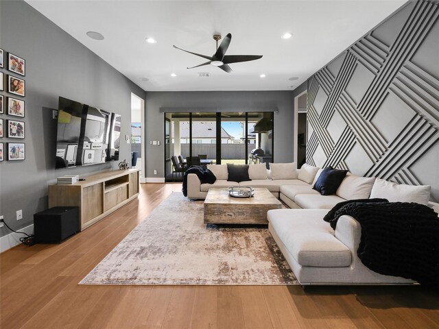 10114 Mariner Oaks Dr, Missouri City, TX 77459 - living area featuring baseboards, ceiling fan, recessed lighting, and light wood-style floors
