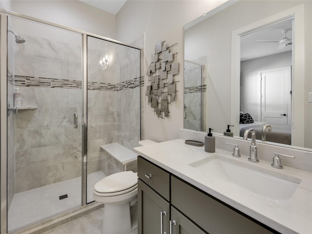 10114 Mariner Oaks Dr, Missouri City, TX 77459 - full bathroom with ceiling fan, toilet, a stall shower, and vanity