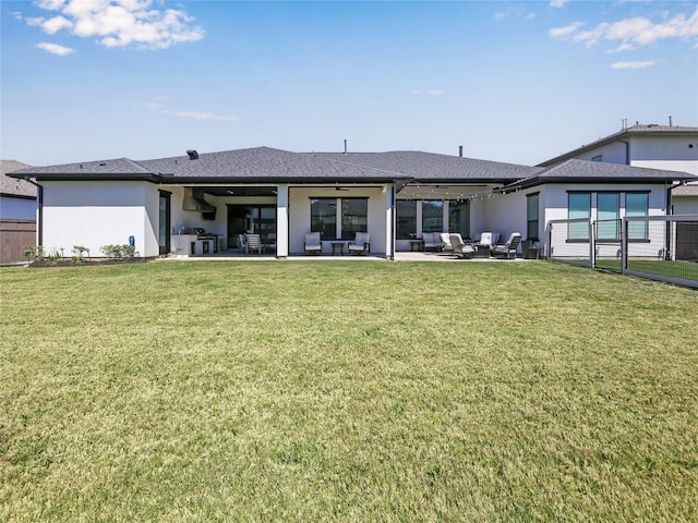 10114 Mariner Oaks Dr, Missouri City, TX 77459 - rear view of property featuring ceiling fan, an outdoor hangout area, a patio, and a yard