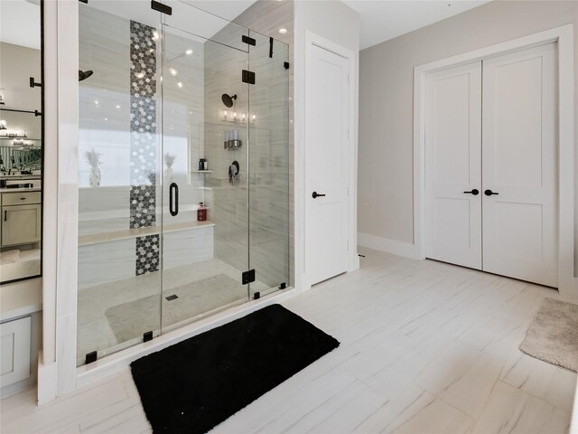 10114 Mariner Oaks Dr, Missouri City, TX 77459 - bathroom with baseboards and a shower stall