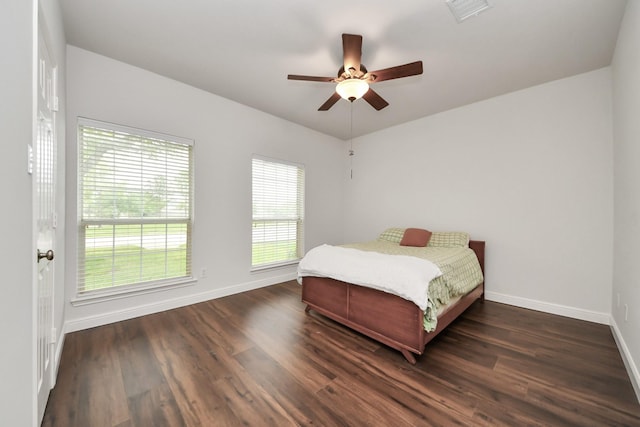313 Overlook Dr, Friendswood, TX 77546 - bedroom with baseboards, ceiling fan, visible vents, and wood finished floors