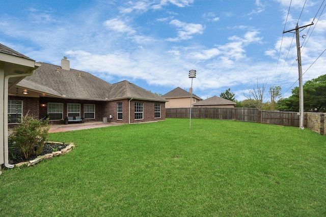 313 Overlook Dr, Friendswood, TX 77546 - view of yard with a fenced backyard and a patio area