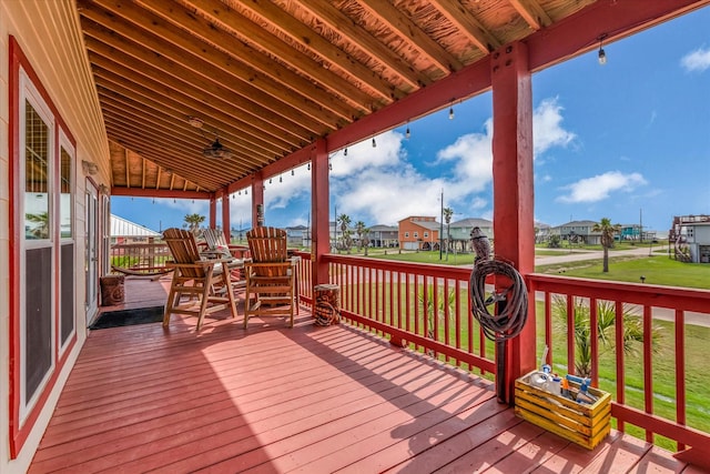 702 Surf Dr, Surfside Beach, TX 77541 - deck featuring a yard and a residential view