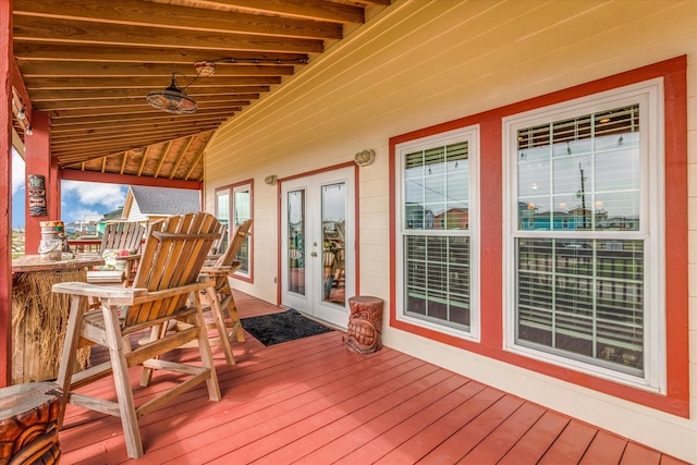 702 Surf Dr, Surfside Beach, TX 77541 - wooden terrace with french doors