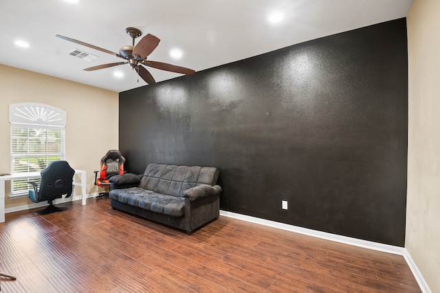 sitting room featuring wood finished floors, visible vents, recessed lighting, and a ceiling fan