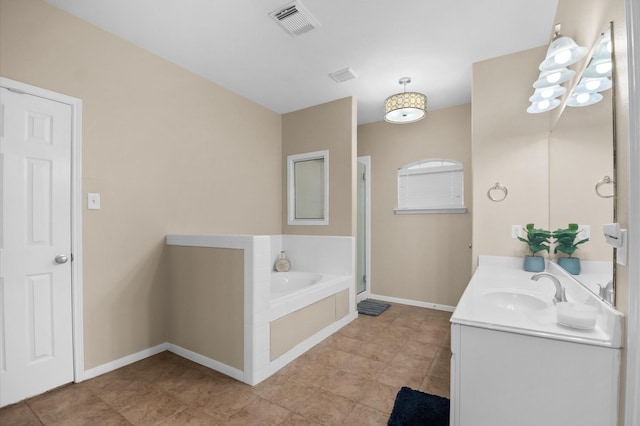 full bathroom with visible vents, a stall shower, baseboards, a bath, and vanity