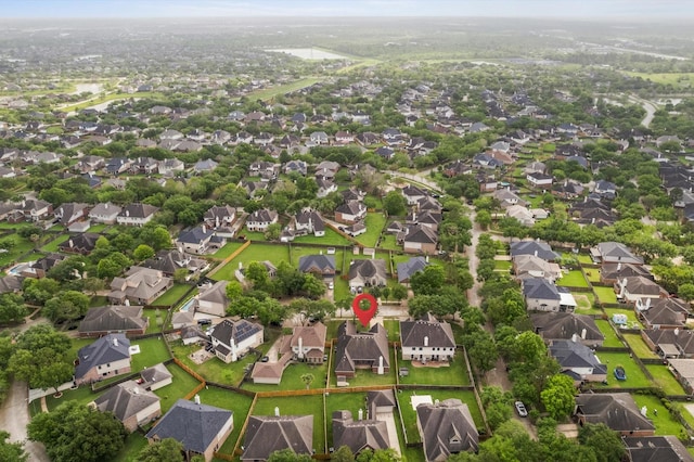 drone / aerial view with a residential view