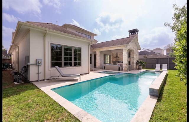 7526 Janak Dr, Houston, TX 77055 - rear view of property with a patio area, stucco siding, a chimney, and a pool with connected hot tub