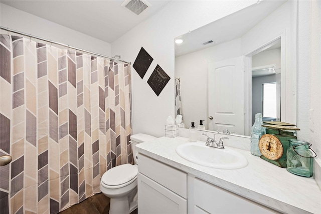 212 Bryan Way, Angleton, TX 77515 - bathroom with visible vents, toilet, vanity, and wood finished floors