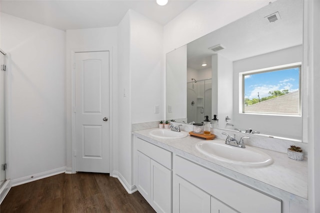 212 Bryan Way, Angleton, TX 77515 - bathroom featuring a shower stall, a sink, and visible vents